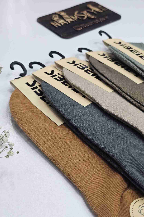 نمای نزدیک بافت جوراب زیر قوزکی