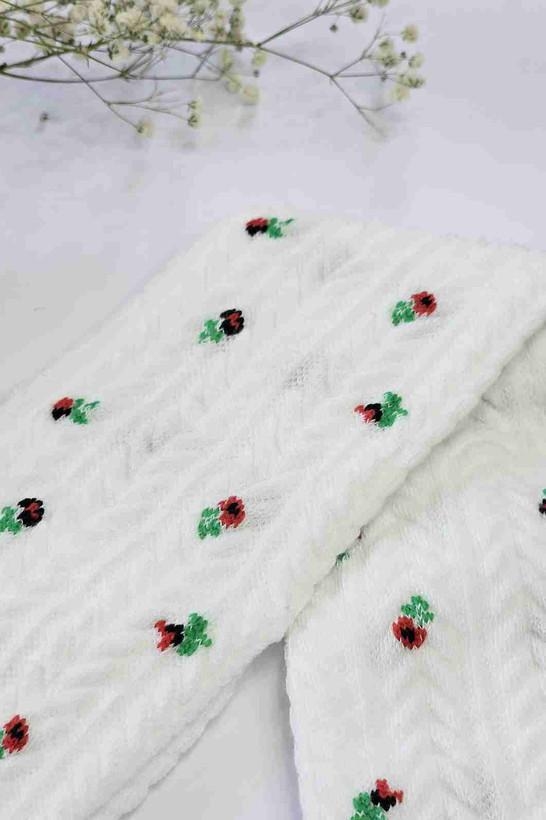 جوراب بچگانه بالای زانو بافت گندمی گلدار رنگ سفید