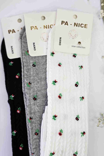 جوراب بچگانه گلدار بالای زانو مناسب ۸ تا ۱۲ سال