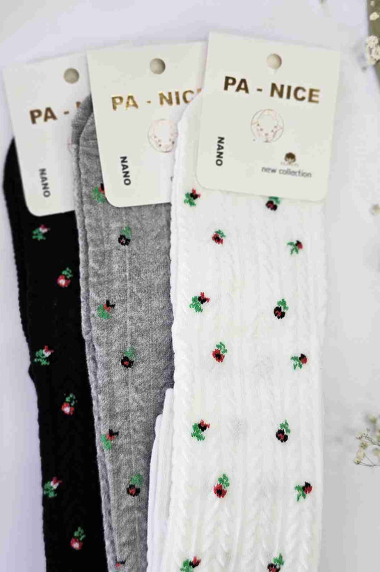 جوراب بچگانه گلدار بالای زانو مناسب ۸ تا ۱۲ سال