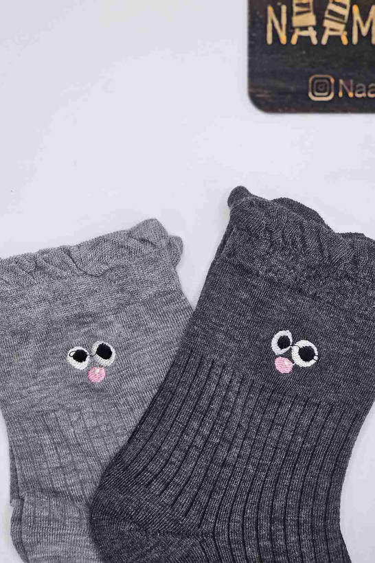 نمای نزدیک جوراب طرح صورتک خندان - کیفیت بافت و طرح جذاب